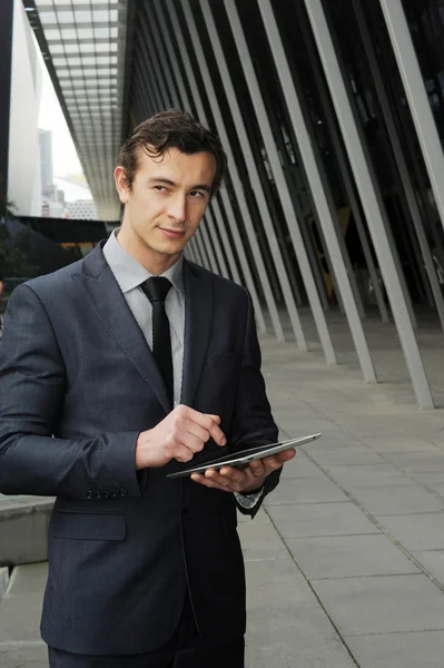Business man on his ipad — Stock Photo, Image