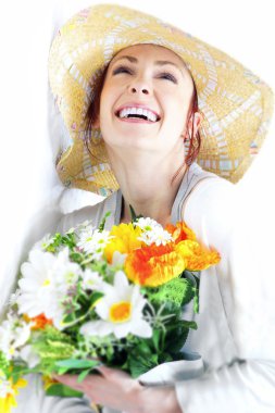 Portrait of young woman with gardening tools clipart