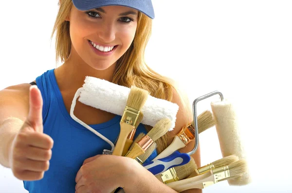 Girl and painting tools — Stock Photo, Image