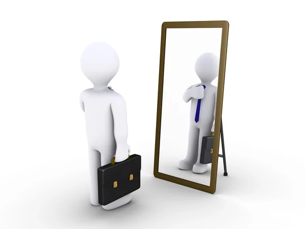 Businessman looking in the mirror — Stockfoto