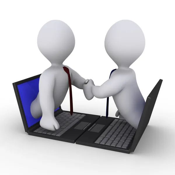 Affärsmän handslag genom laptop — Stockfoto