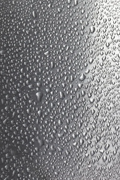 Gocce d'acqua su metallo spazzolato — Foto Stock