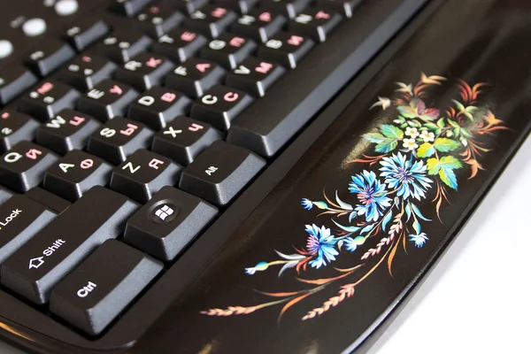The computer keyboard with an art list. — Stock Photo, Image