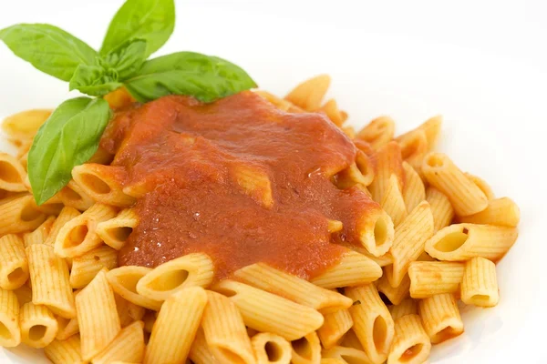 Penne with tomato sauce and basil — Stock Photo, Image