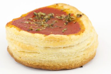 Puff pastry pizzas with tomatoes clipart