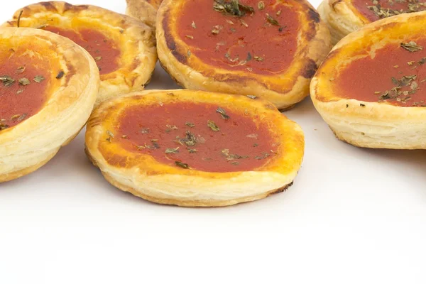 Puff pastry pizzas with tomatoes — Stock Photo, Image