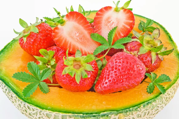 Melon with strawberries — Stock Photo, Image