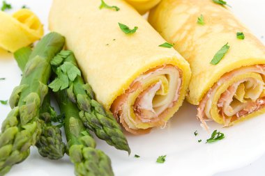 Roll with ham, cheese and asparagus clipart