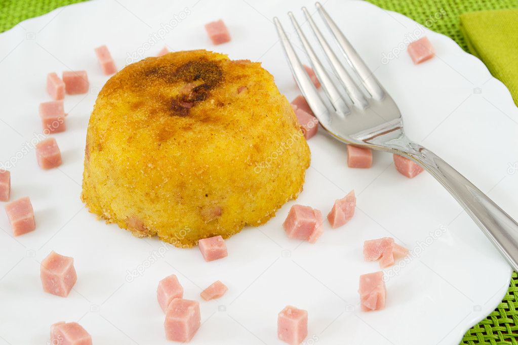Souffle potatoes with ham cubes