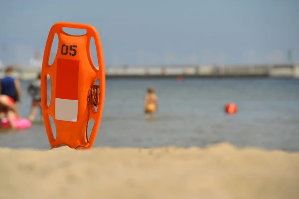Life guard can at sunny beach Stock Photo