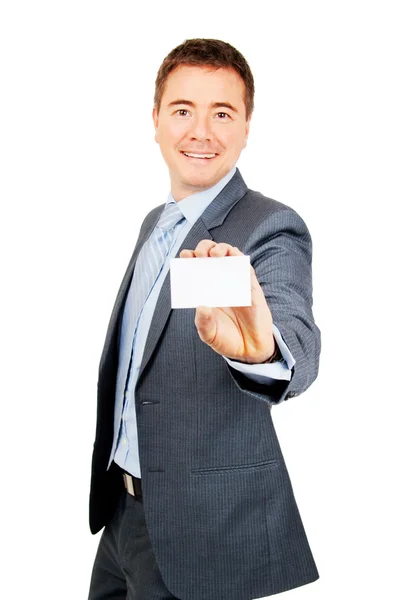 Jistý obchodní muž drží Prázdná vizitka — Stock fotografie