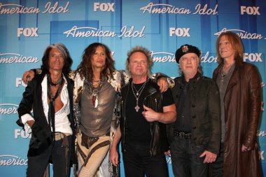 Aerosmith - (L-R) Musicians Joe Perry, Steven Tyler, Joey Kramer, Brad Whitford, and Tom Hamilton clipart