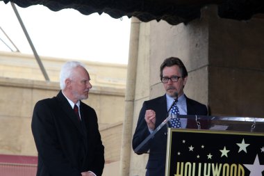 Malcolm Mcdowell, Gary Oldman