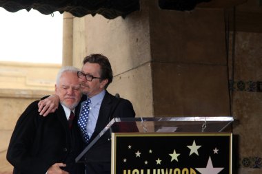 Malcolm Mcdowell, Gary Oldman