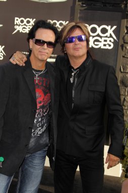 Bobby Dall, Rikki Rockett