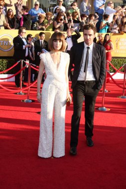 Arrives at the 18th Annual Screen Actors Guild Awards clipart