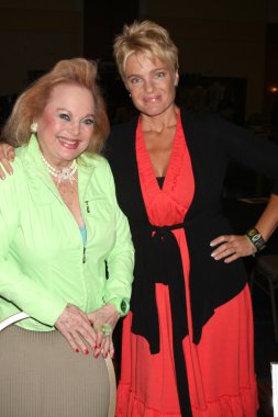 Carol Connors, Erika Eleniak