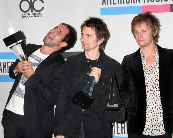 Muse - Christopher Wolstenholme, Matthew Bellamy és Dominic Howard — Stock Fotó