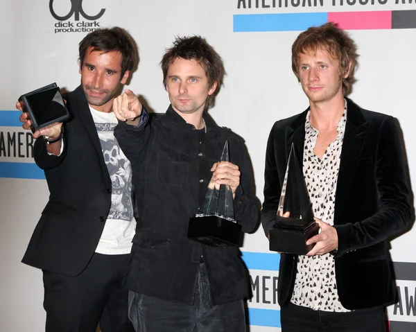 Muse - Christopher Wolstenholme, Matthew Bellamy and Dominic Howard — Stock Photo, Image