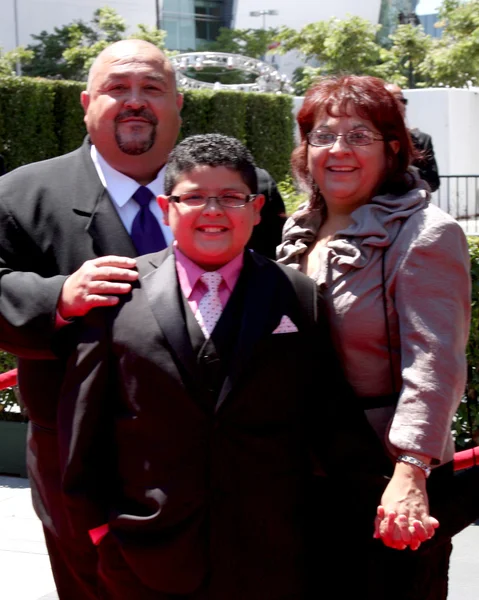 Рико Родригес и его родители — стоковое фото