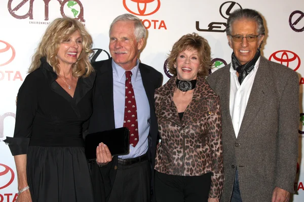 Gæst, Ted Turner, Jane Fonda og Richard Perry - Stock-foto