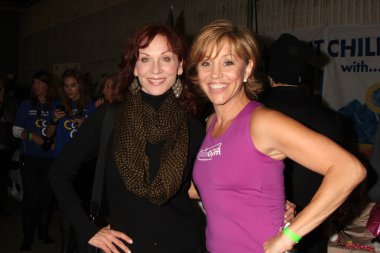 Marilu Henner, Forbes Riley