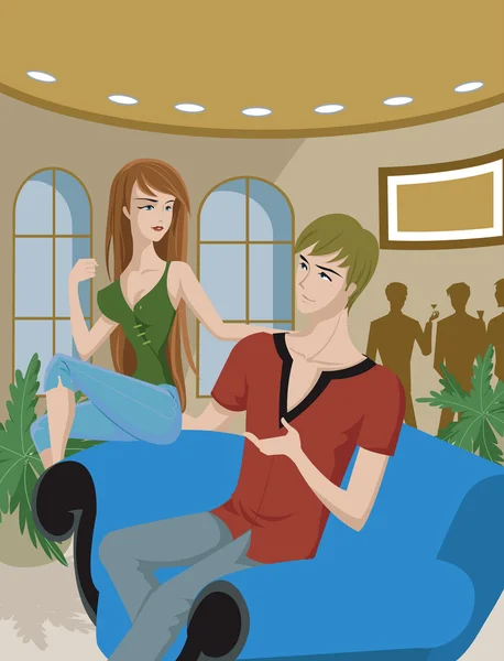 A couple talking on a sofa at a social gathering — Stock Photo, Image