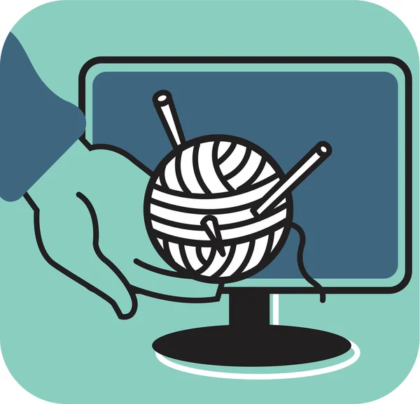 Hand holding ball of wool in front of computer monitor — Stock Photo, Image