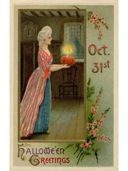 Una imagen vintage de Halloween de una mujer vestida con atuendo victoriano llevando una calabaza iluminada —  Fotos de Stock