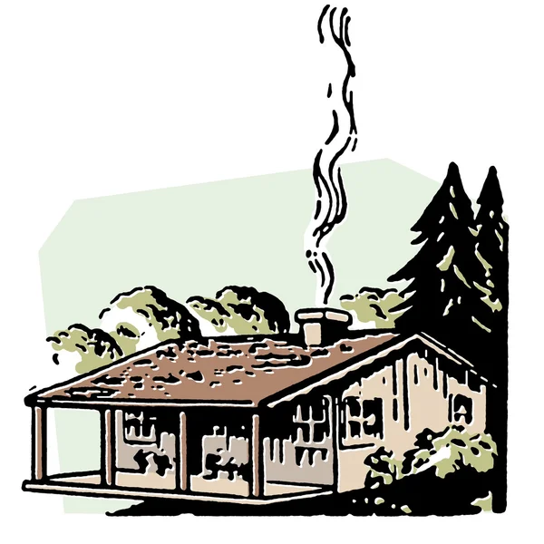 Небольшой фермерский дом с дымящимся шимни — стоковое фото