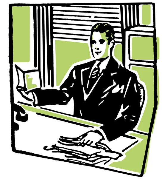 En svartvit version av en affärsman som sitter vid sitt skrivbord — Stockfoto