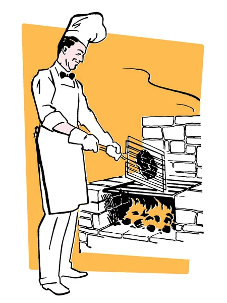 Ένας σεφ μαγειρικής σε μια πυρκαγιά σχαρών — Φωτογραφία Αρχείου