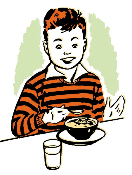 Młody chłopak, ciesząc się jego obiad — Zdjęcie stockowe