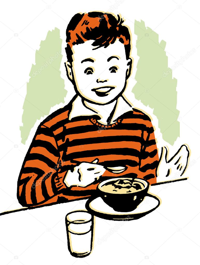 A young boy enjoying his dinner