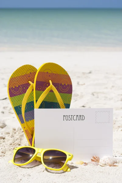 BLANK POSTCARD ON THE BEACH SAND Stock Picture