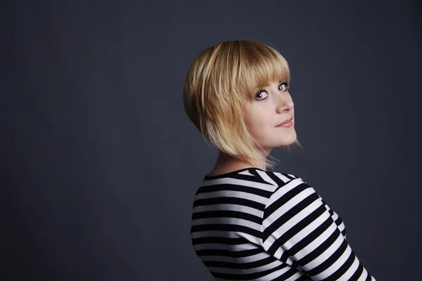 stock image Portrait of an young woman in striped vest