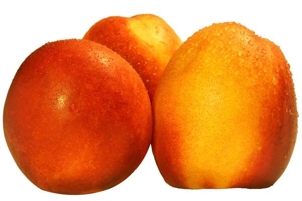 Tre persika isolerad på vit bakgrund — Stockfoto