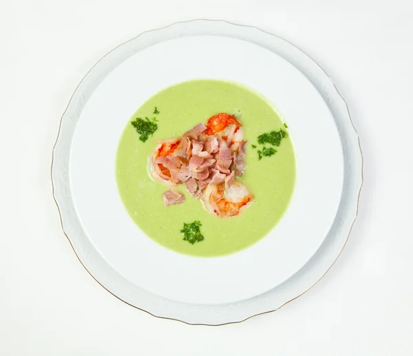 Pea soup with shrimps and bacon — Stock Image Pea soup with shrimps and bacon Stock Photo