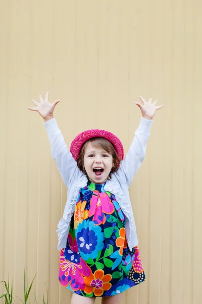 Funny toddler girl in red hat — Stock Photo, Image