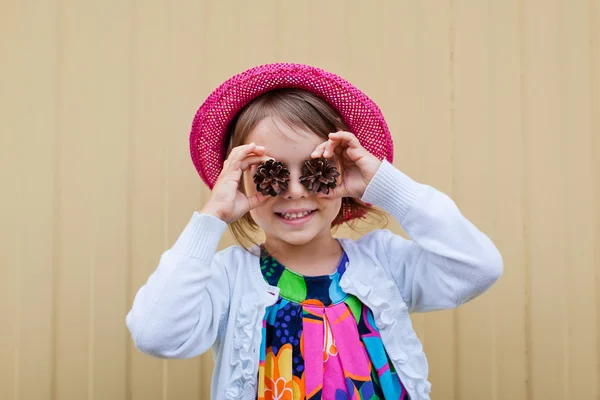 Funny toddler girl in red hat — Stock Photo, Image
