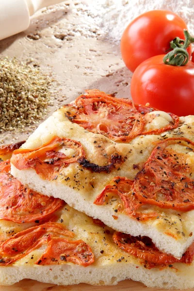 Rustic slices pizza with tomato — Stock Photo, Image