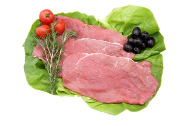 Veal in slices on white background clipart