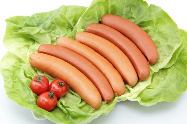 Hotdog на белом фоне — стоковое фото
