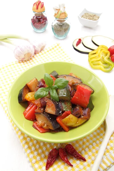 Vegetables sausages eggplant tomato onion chilipepper parsley — Stock Photo, Image