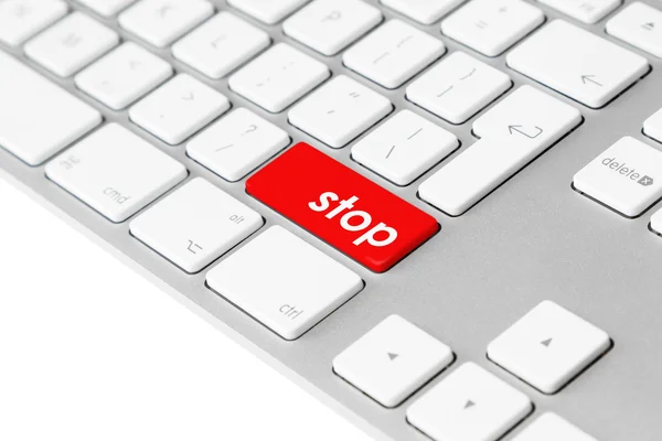 Computer keyboard with red “stop” button — Stock Photo, Image