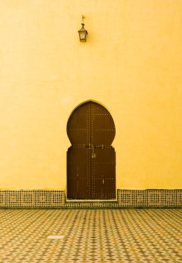 Door in the mausoleum of Moulay Ismail at Meknes, Morocco. clipart