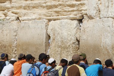 Praying at Western wall clipart