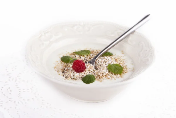 stock image Yogurt with oat brain, raspberry and mint