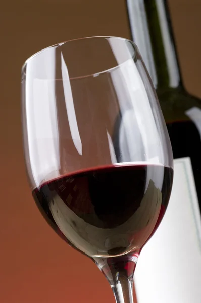 Bottle of red vine and glass — Stock Photo, Image