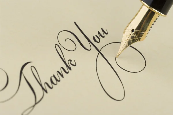 Inscription Thank you with gold pen — Stock Photo, Image